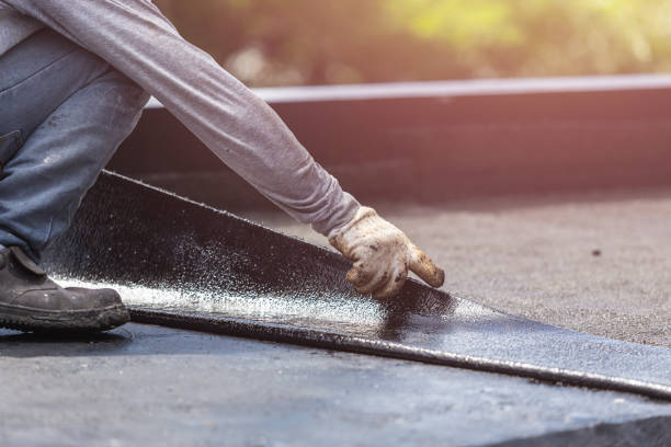Professional Waterproofing technician working in Bowie, MD